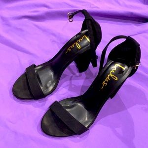 Brand new never worn black heels lulus size 7